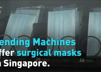 IZLAZE IZ KUĆE SA MASKAMA: Stoga su diljem Singapura postavljeni aparati sa zaštitnim maskama